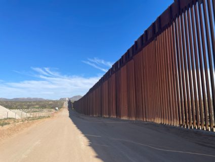 Humanitarian group aids migrants at U.S.-Mexico border wall near Sasabe, Arizona