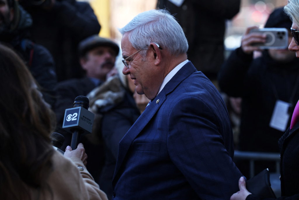 U.S. Senator Bob Menendez leaves his arraignment on a new 18-count indictment , at Manhattan federal court in New York City