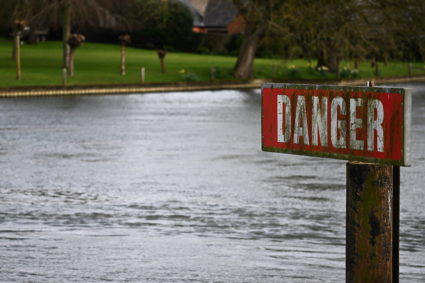 A "Danger" sign on the River Thames, in Hambledon