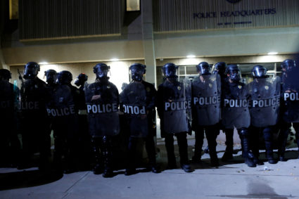 FILE PHOTO: Protestors hold a vigil during a protest in Phoenix