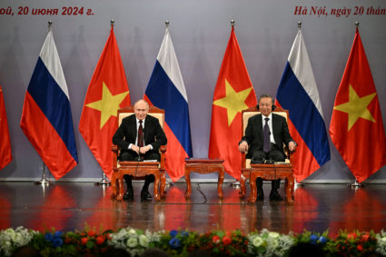 Putin signs deals with Vietnam in effort to bolster ties in Asia to offset Moscow's growing isolation