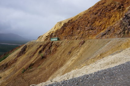 A shuttle bus passes the Pretty Rocks site in Denali National Park, Alaska