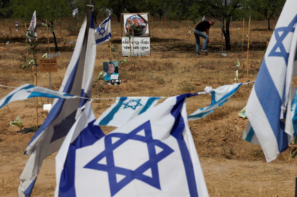 People visit the site of the Nova festival, where partygoers were killed and kidnapped during the October 7 attack by Pale...