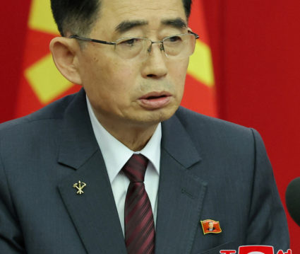 North Korean officials wear Kim Jong Un pins for first time as nation