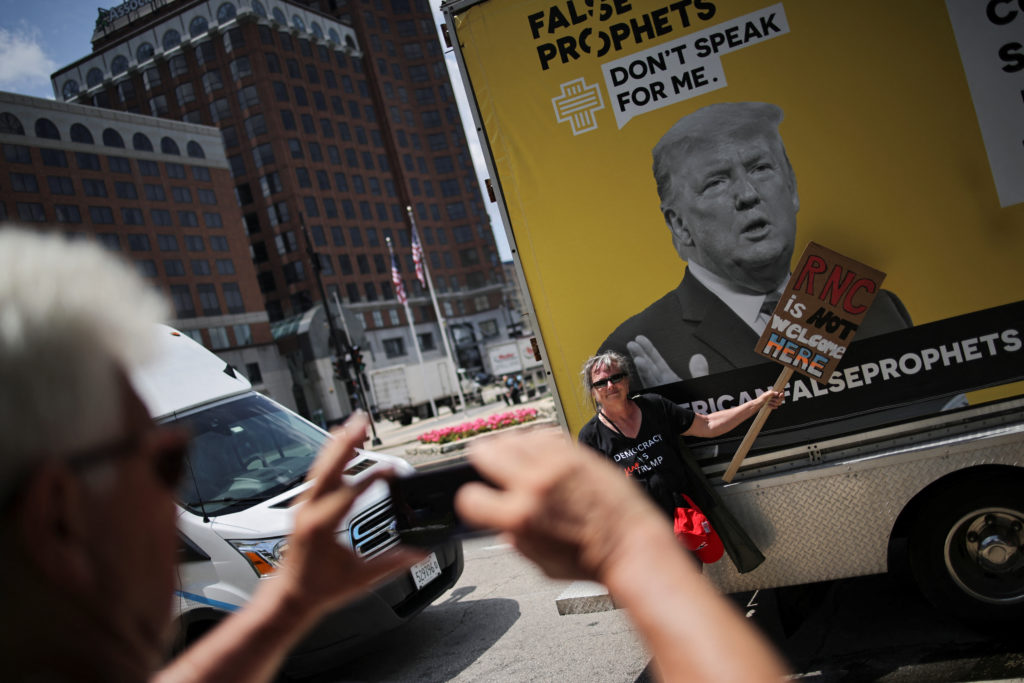 Demonstrators and members of the The Coalition to March on the RNC hold a rally, on the first day of the Republican Nation...