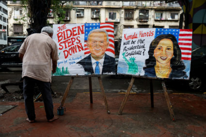 An art school teacher paints pictures of U.S President Joe Biden and U.S Vice President Kamala Harris after Biden announce...