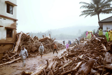 Landslides caused by heavy rains in southern India kill at least 93 and bury many others