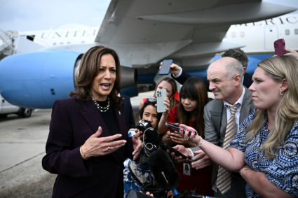 Harris steps off of Air Force Two upon arrival at Joint Base Andrews in Maryland