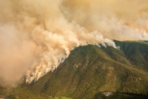 Smoke rises from the Shetland Creek wildfire near Ashcroft