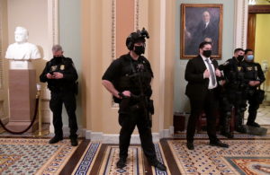 Security is upgraded in aftermath of Trump supporters breeching the US Capitol
