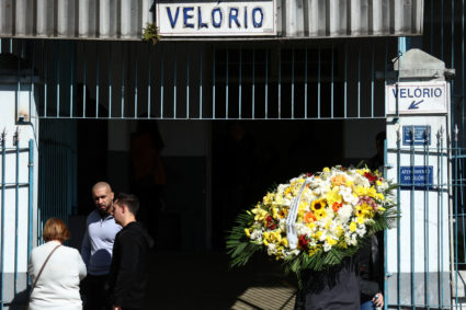 People attend the wake for a victim of the airplane crash in Sao Paulo