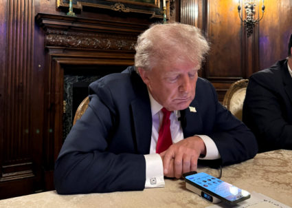 Former U.S. President Donald Trump speaks as he participates in an interview with billionaire entrepreneur Elon Musk on th...