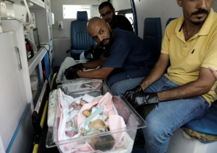 Palestinian premature babies are evacuated from Al-Aqsa Hospital following Israeli evacuation orders for nearby areas, in ...
