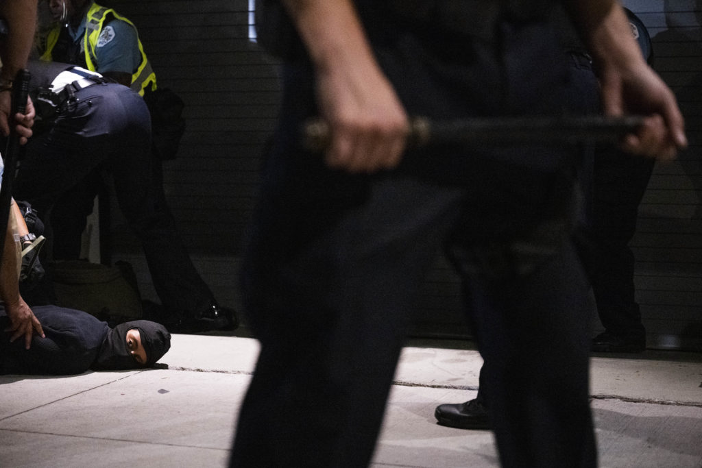 CHICAGO, ILLINOIS - August 20: Demonstrators clash with police