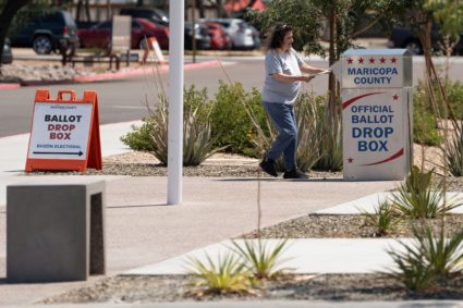 Voters head to the polls for the state primary election in Phoenix