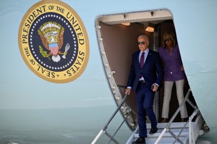 U.S. President Joe Biden and first lady Jill Biden disembark Air Force One, on their way to the Democratic National Conven...