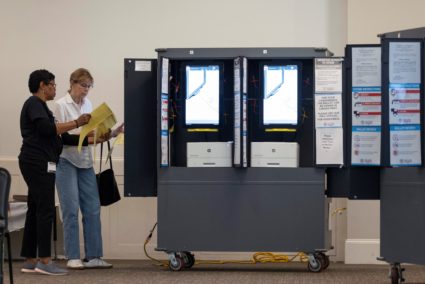 Fulton County voters cast their ballots during the Georgia primary on Election Day at Morningside Presbyterian Church in A...