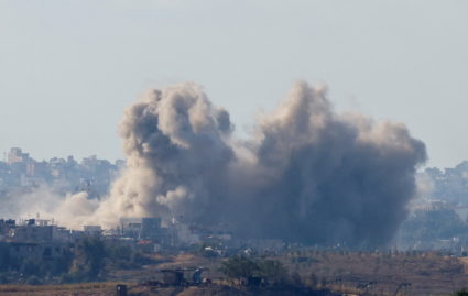 Smoke rises following an airstrike in Gaza, as seen from southern Israel
