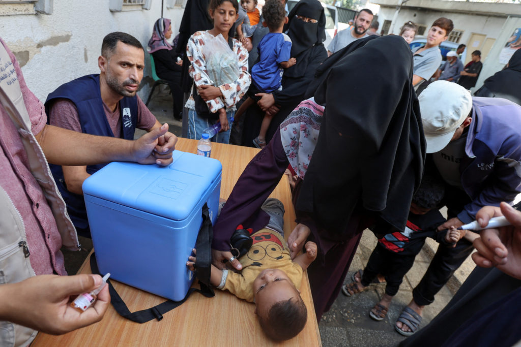 Palestinian children are vaccinated against polio, in Deir Al-Balah in the central Gaza Strip