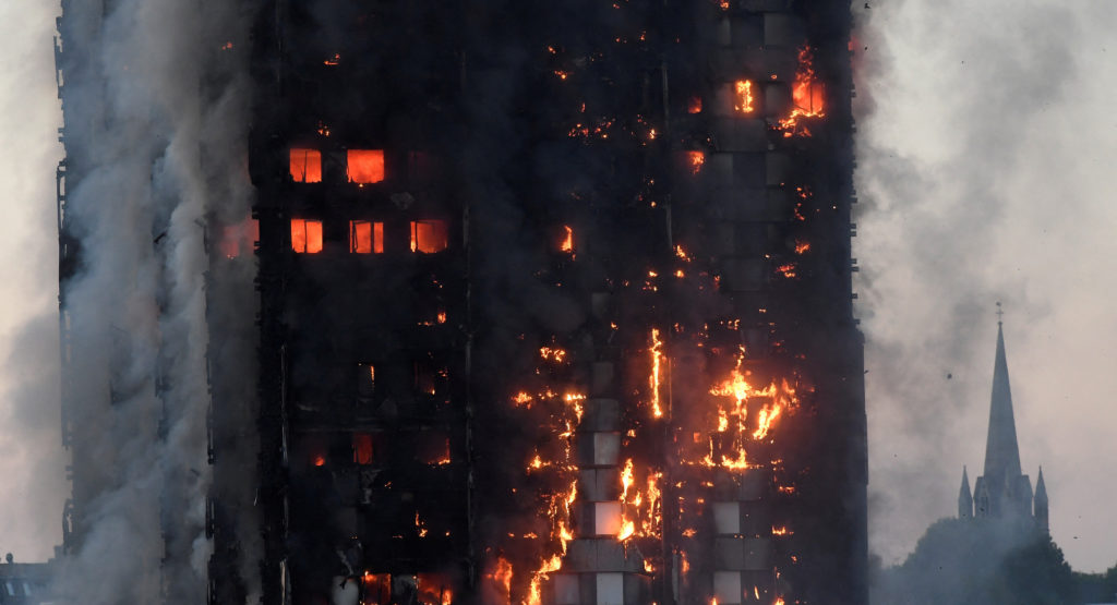 FILE PHOTO: The Grenfell Tower residential building is seen on fire in London