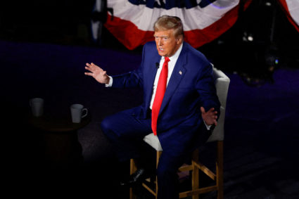 FILE PHOTO: Republican presidential nominee and former U.S. President Donald Trump attends a Fox News town hall event in H...
