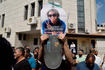 Hundreds gather on a Seattle beach to remember an American activist killed by the Israeli military