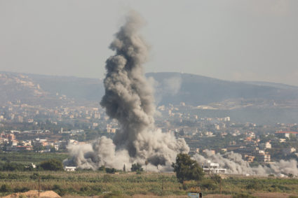 Smoke billows over southern Lebanon following Israeli strikes, as seen from Tyre, southern Lebanon