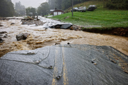 Bridge over creek destroyed by flood waters from Tropical Storm Helene in Vilas, North Carolina