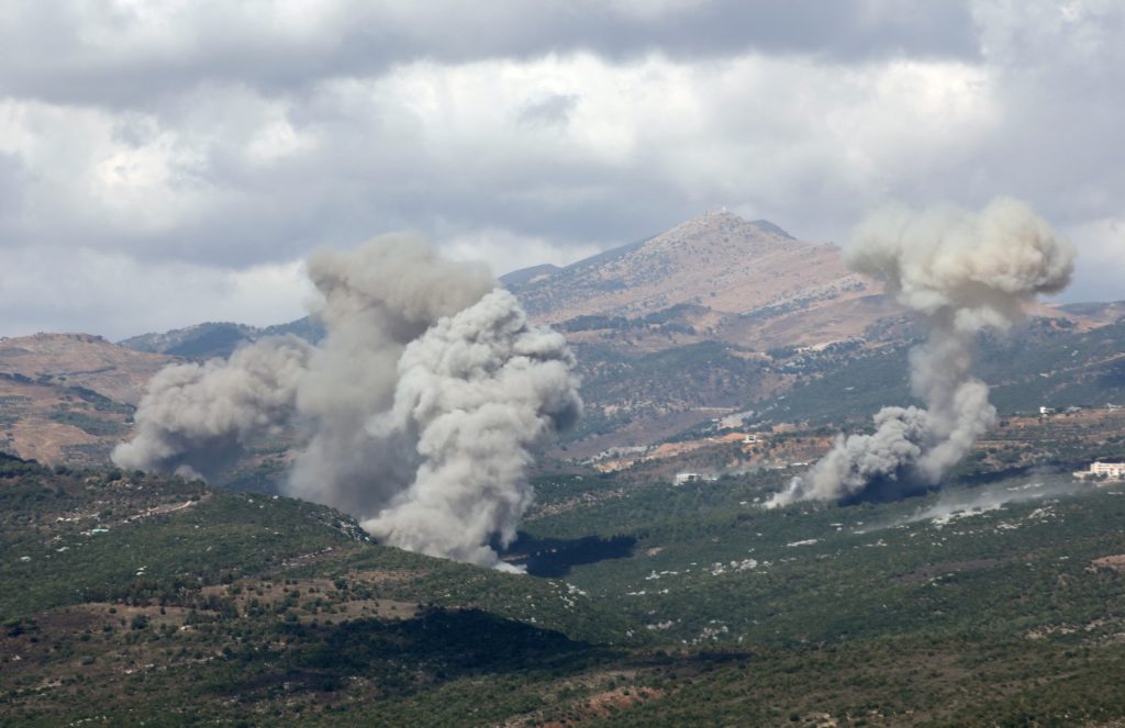 Smoke rises from Jabal al-Rihan as pictured from Marjayoun