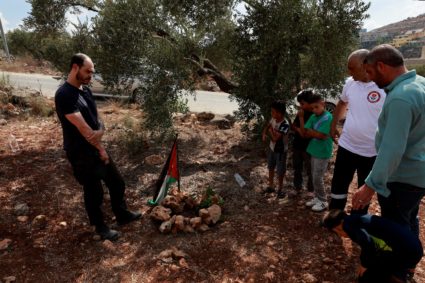 An Israeli peace activist Jonathan Pollak, stands near the site where Aysenur Ezgi Eygi, a U.S.-Turkish activist who died ...