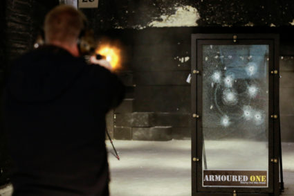 Armoured One Tactical Consultant Michael Poland shoots one of the company's security glass for an active shooter preparedn...