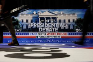 People walk at the Philadelphia Convention Center ahead of the presidential debate, in Philadephia