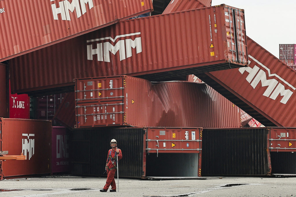 Fallen cargo containers are piled up after Typhoon Krathon made landfall in Kaohsiung