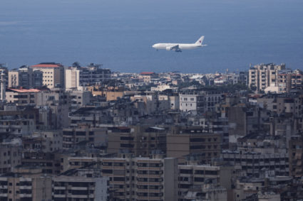 Smoke rises over Dahiyeh in Beirut's southern suburbs, as seen from Sin El Fil