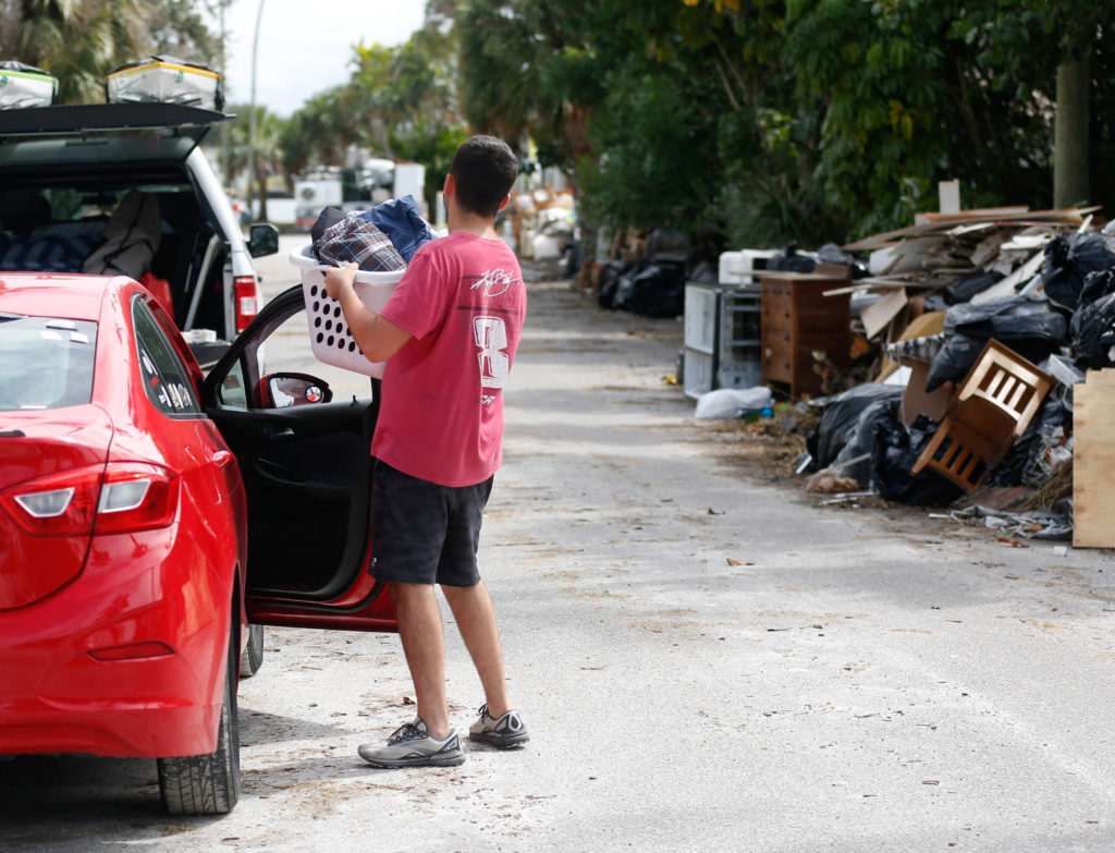 People prepare for Hurricane Milton to make landfall, in St. Pete Beach, Florida