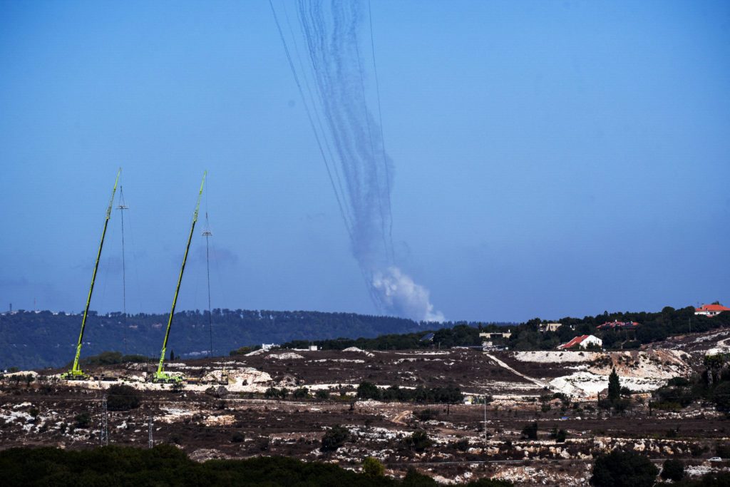 Rockets are launched from Lebanon towards Israel, amid cross-border hostilities between Hezbollah and Israel, as seen from...