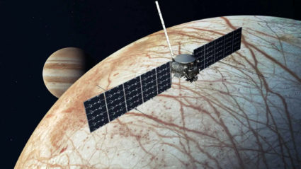 Artist's concept of NASA's Europa Clipper spacecraft flying past Jupiter's moon Europa