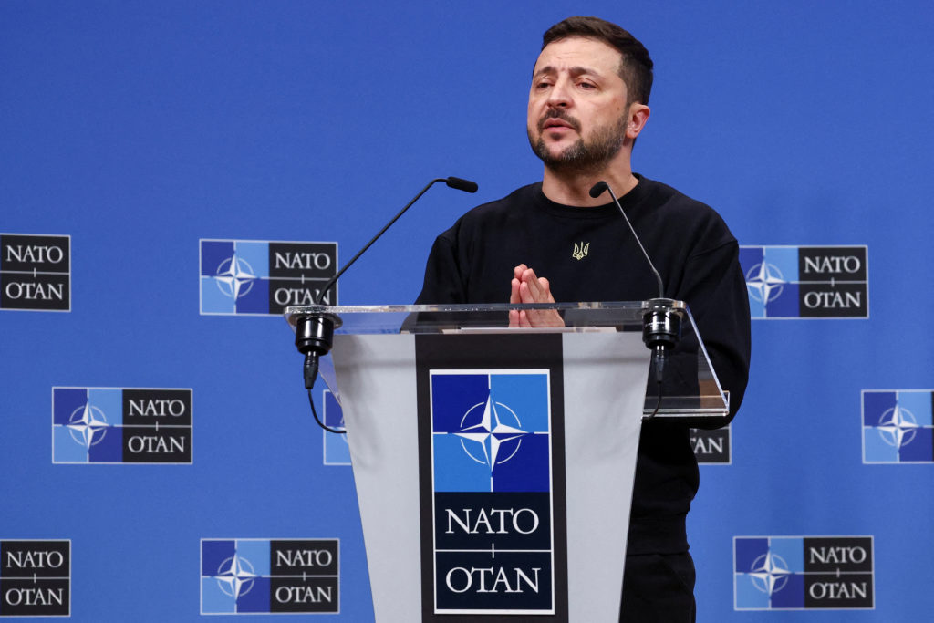 FILE PHOTO: Ukraine's President Volodymyr Zelenskiy attends a press conference, in Brussels