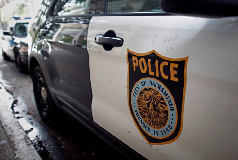 The Sacramento Police shield is seen on a police vehicle in Sacramento