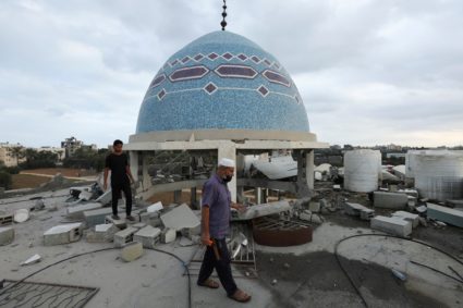 site of an Israeli strike on a mosque sheltering displaced people, in Deir Al-Balah