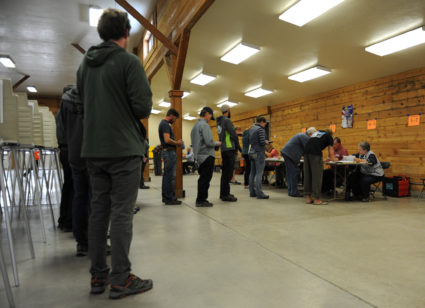 Voters wait in line to vote at the Gallatin County Fairgrounds in Bozeman