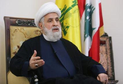 Lebanon's Hezbollah deputy leader Sheikh Naim Kassem speaks during an interview with Reuters in Beirut's suburbs