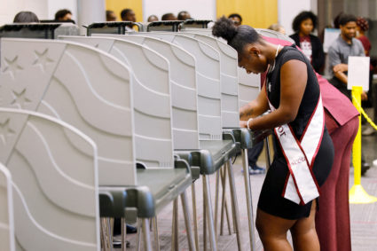 FILE PHOTO: HBCU (Historically Black College and University) students march to the polls during early voting in North Caro...