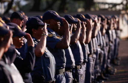 Members of the police participate in a parade before leaving for election duty across the KwaZulu Natal province in Durban