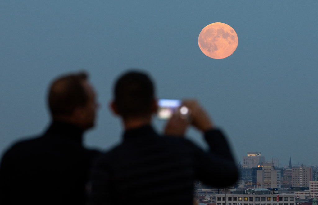 Full moon, known as the Hunter's moon, rises in Berlin