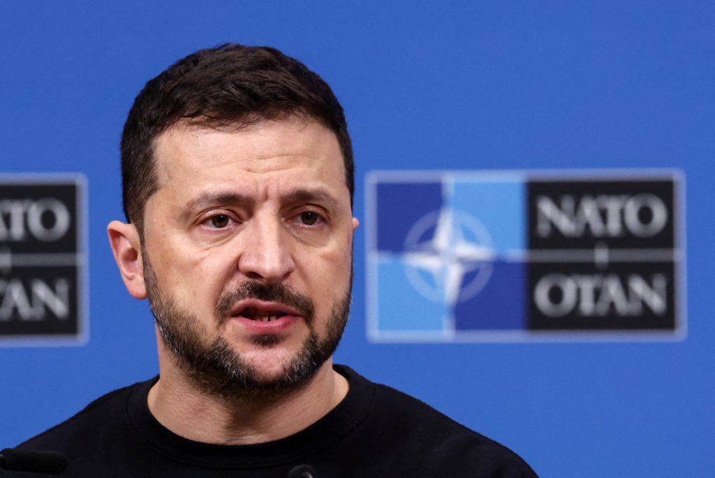FILE PHOTO: Ukraine's President Volodymyr Zelenskiy attends a press conference, in Brussels