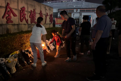 Driver kills 35 by ramming car into crowd in China. Police say he was upset about his divorce