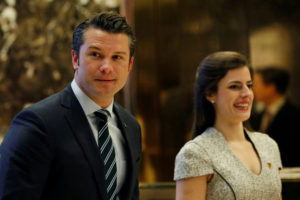 FILE PHOTO: Pete Hegseth, former executive director of Vets For Freedom, looks at the media members while waiting for the ...