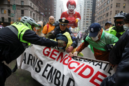 Big balloons, wet weather and 21 protesters arrested at Macy's Thanksgiving Day Parade