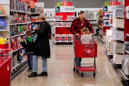 FILE PHOTO: Shoppers converge in a Target store ahead of the Thanksgiving holiday
